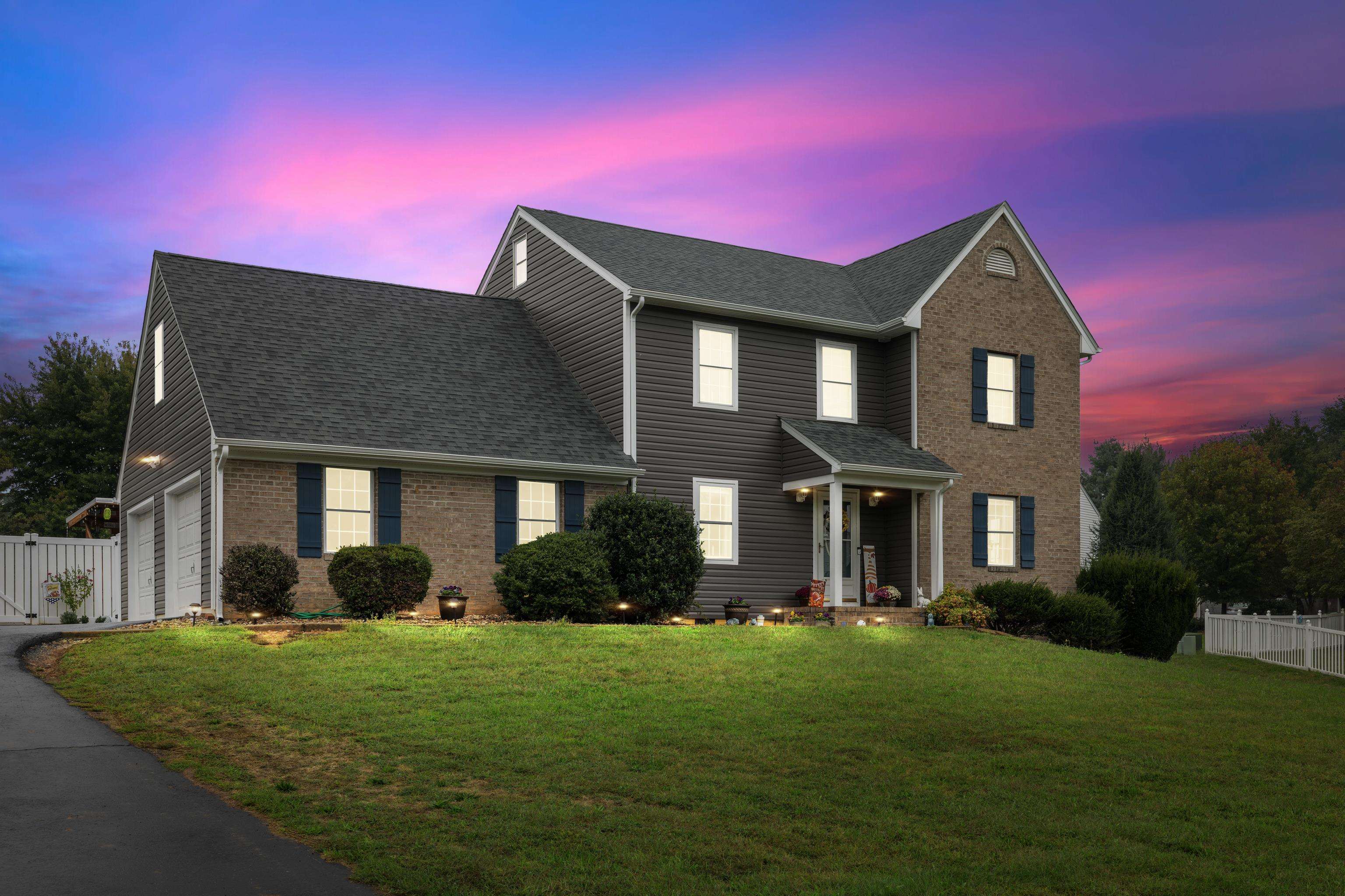 48 Meadow Ridge Road Waynesboro, VA 22980 - Photo 1 of 71 a front view of a house with a yard and garage
