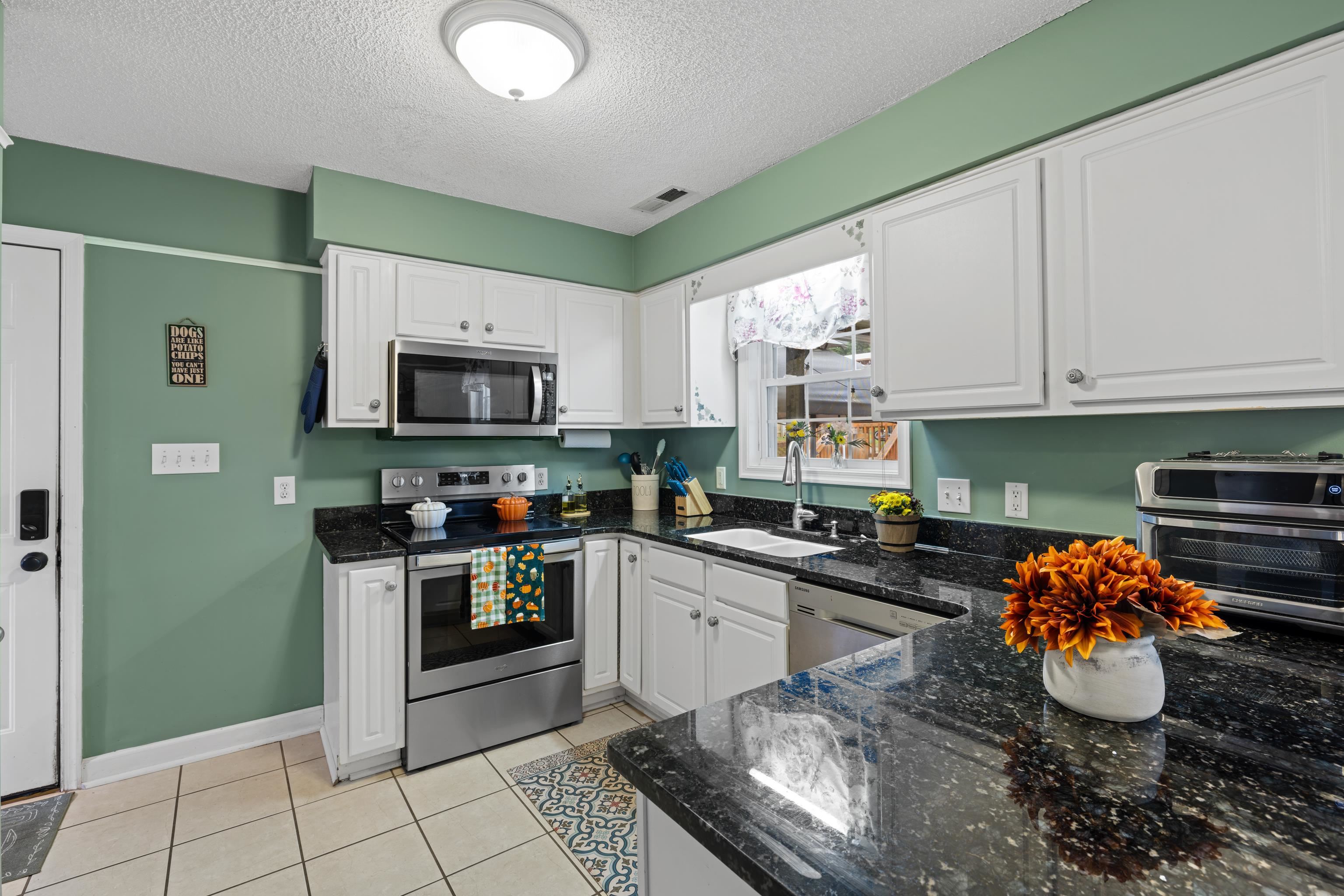 48 Meadow Ridge Road Waynesboro, VA 22980 - Photo 19 of 71 a kitchen with a sink a stove and cabinets