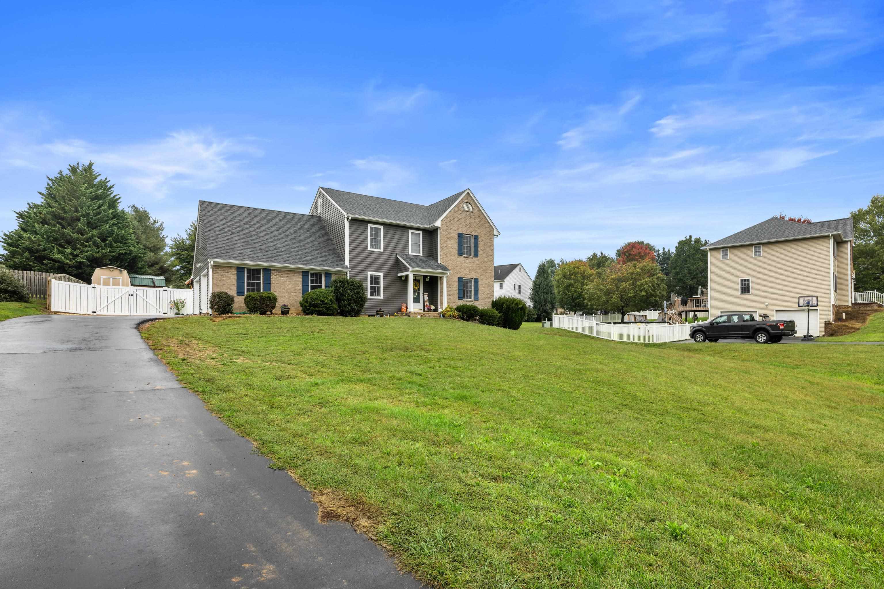 48 Meadow Ridge Road Waynesboro, VA 22980 - Photo 3 of 71 a front view of a house with a yard