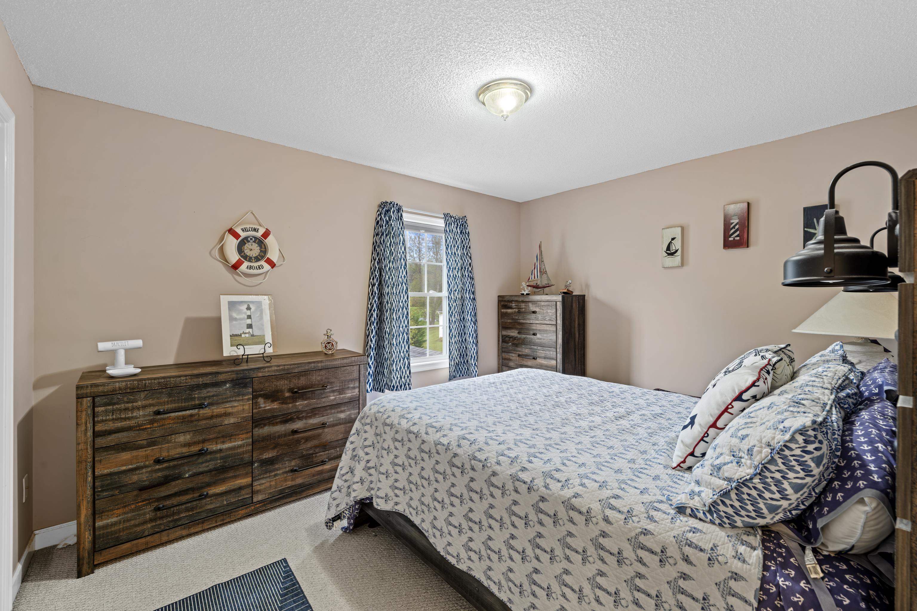 48 Meadow Ridge Road Waynesboro, VA 22980 - Photo 35 of 71 a bedroom with a bed and a dresser