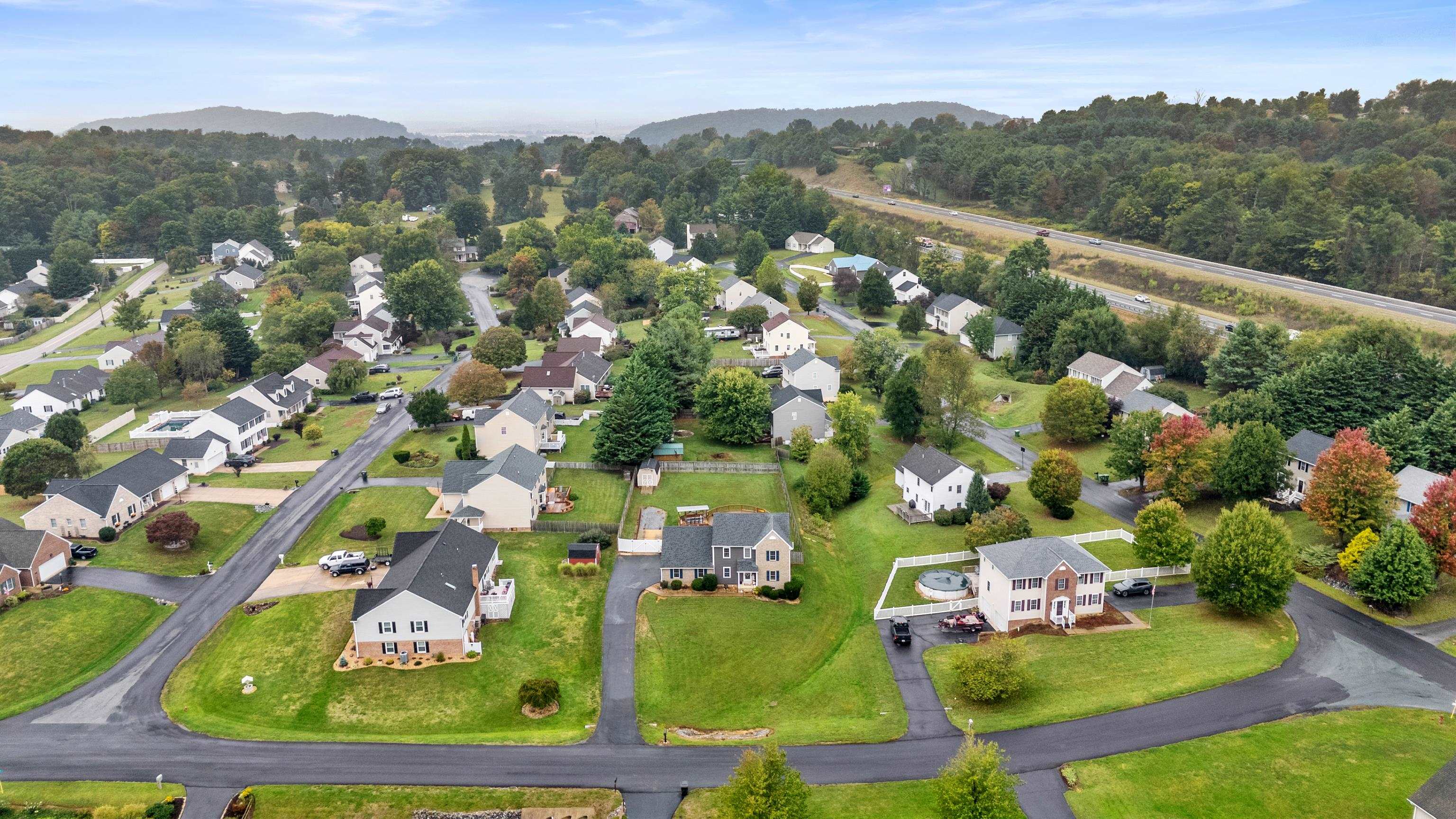 48 Meadow Ridge Road Waynesboro, VA 22980 - Photo 70 of 71 an aerial view of residential houses with outdoor space and trees