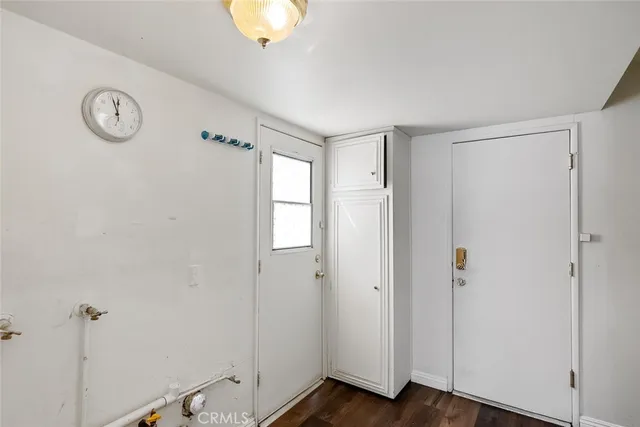 a view of a room with rack on the wall