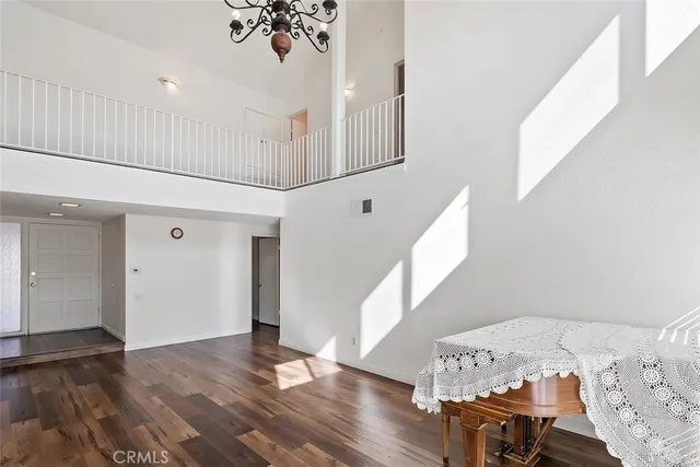 a view of a livingroom with furniture and stairs