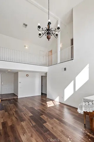 a view of a livingroom with wooden floor