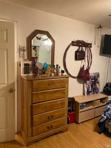 a room with a mirror and gym equipment