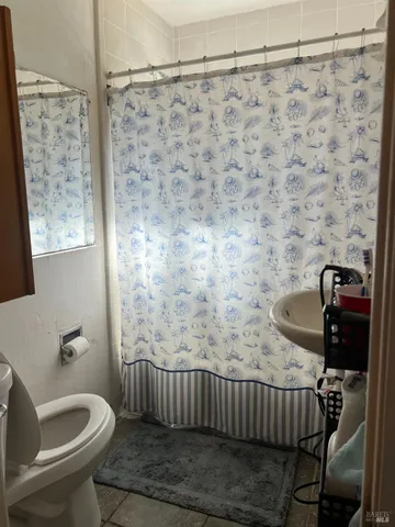a bathroom with a sink and a shower