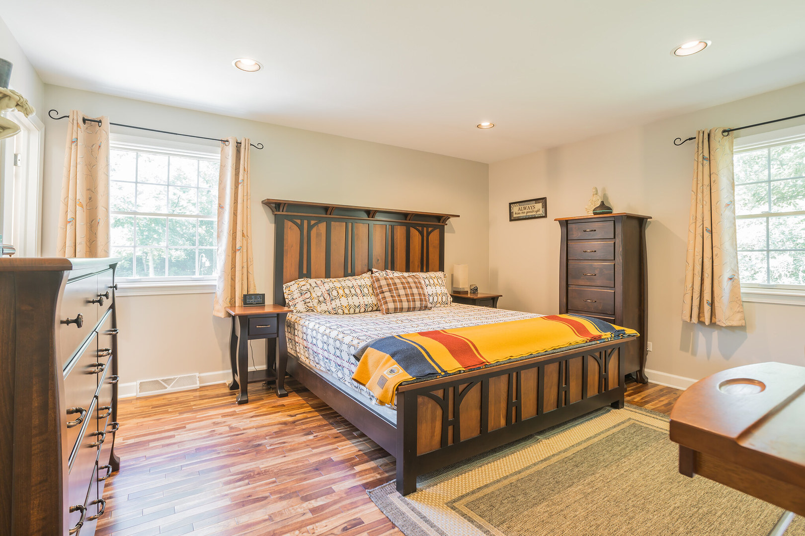 234 Valley Road Trout Valley, IL 60013 - Photo 14 of 29 a bedroom with a bed and wooden floor
