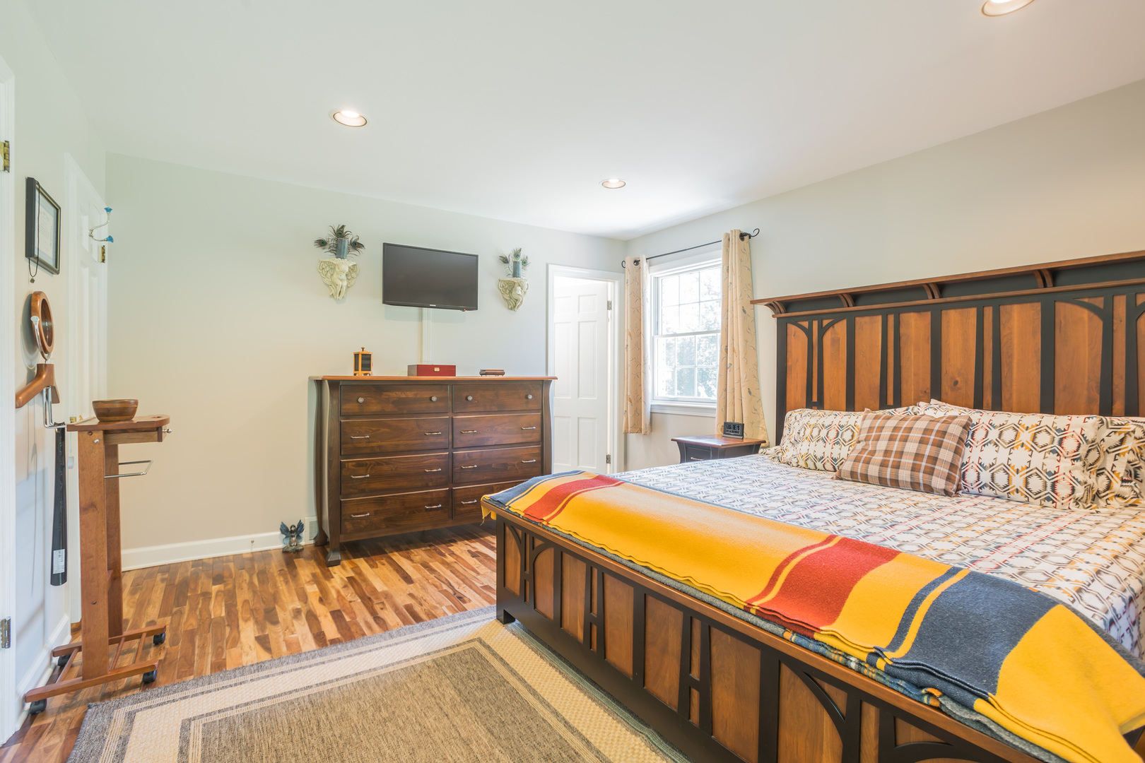 234 Valley Road Trout Valley, IL 60013 - Photo 15 of 29 a bedroom with a bed and wooden floor