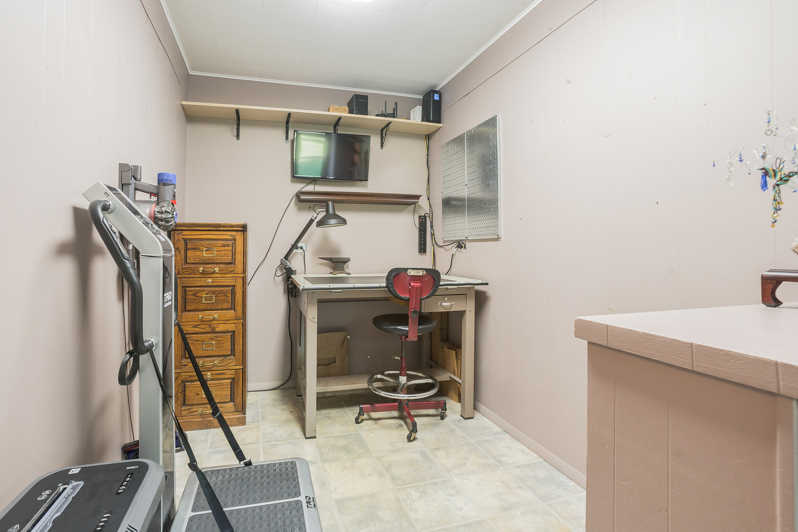 234 Valley Road Trout Valley, IL 60013 - Photo 19 of 29 a view of storage and utility room with racks on the wall
