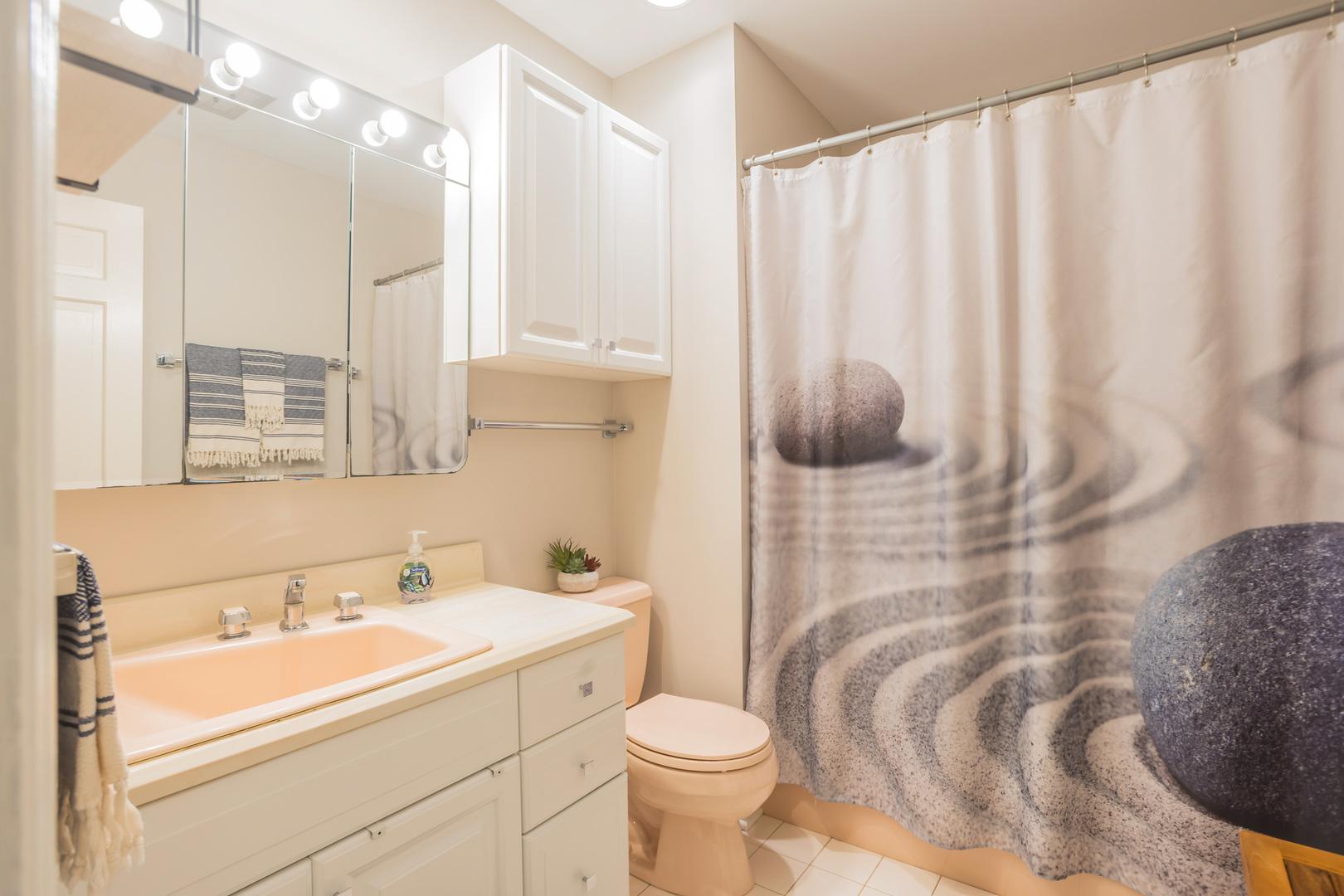 234 Valley Road Trout Valley, IL 60013 - Photo 20 of 29 a bathroom with a sink a toilet and shower curtain