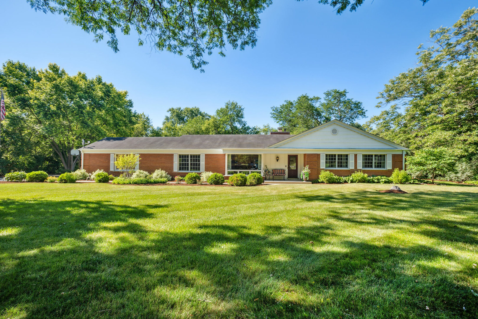 234 Valley Road Trout Valley, IL 60013 - Photo 2 of 29 a front view of a house with a garden