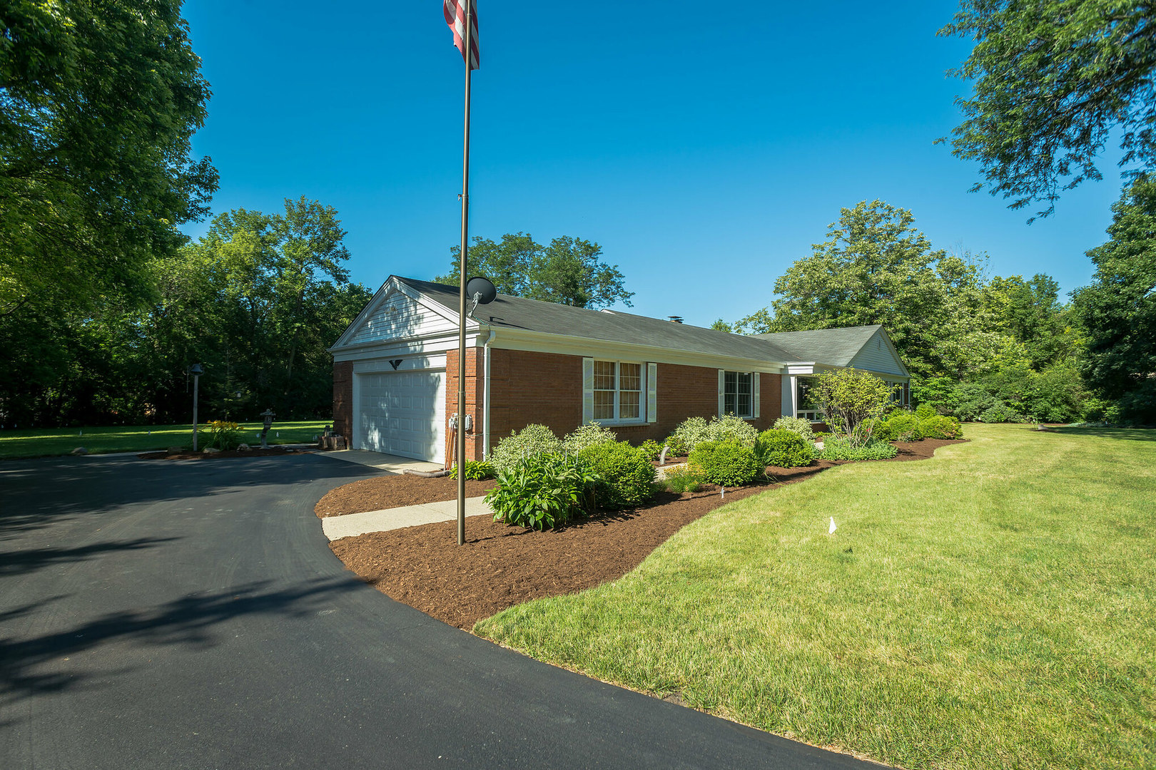 234 Valley Road Trout Valley, IL 60013 - Photo 3 of 29 a front view of house with yard and green space