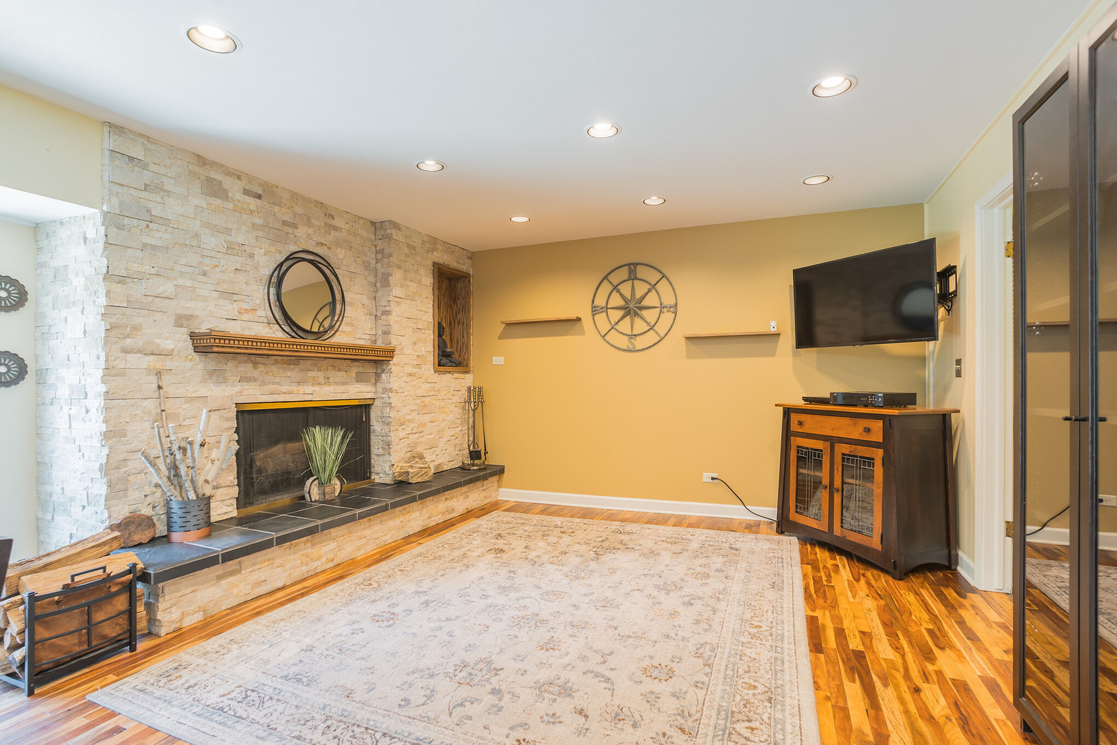 234 Valley Road Trout Valley, IL 60013 - Photo 7 of 29 a view of a livingroom with a fireplace