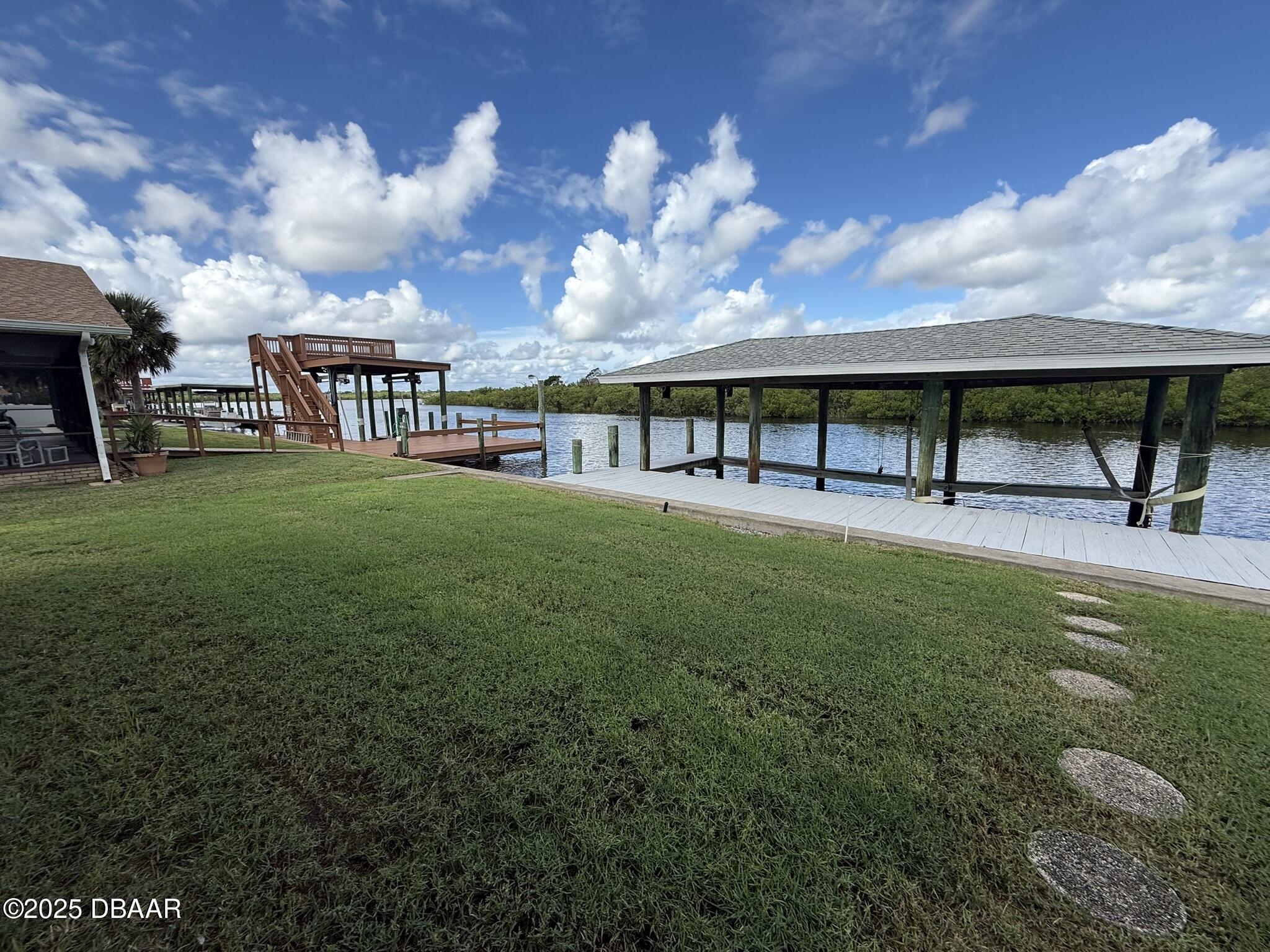 126 Carriage Ponce Inlet, FL 32127 - Photo 5 of 20 a view of house with yard and entertaining space