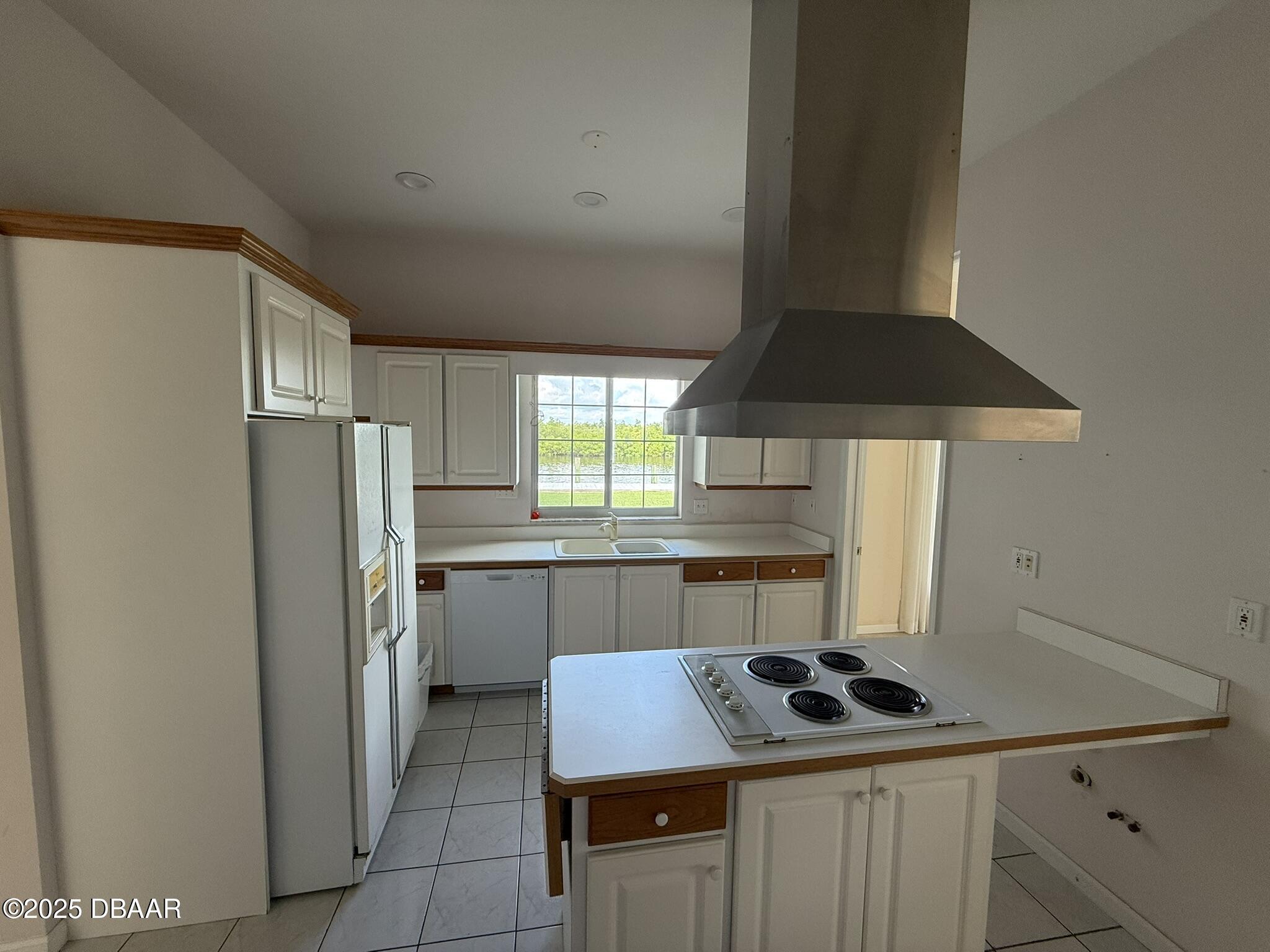 126 Carriage Ponce Inlet, FL 32127 - Photo 9 of 20 a kitchen with a sink cabinets and appliances