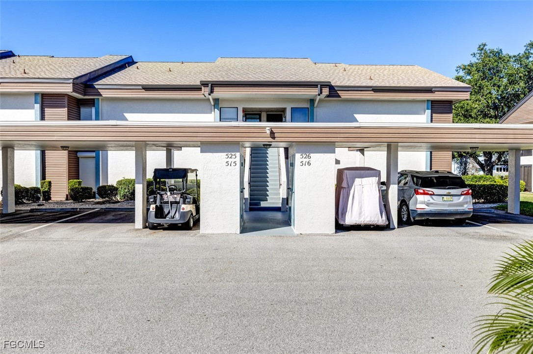 5710 Trailwinds Drive, Unit 525 Fort Myers, FL 33907 - Photo 1 of 37 a view of a car garage