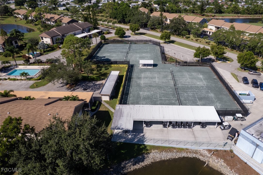 5710 Trailwinds Drive, Unit 525 Fort Myers, FL 33907 - Photo 35 of 37 a picture of houses with outdoor space