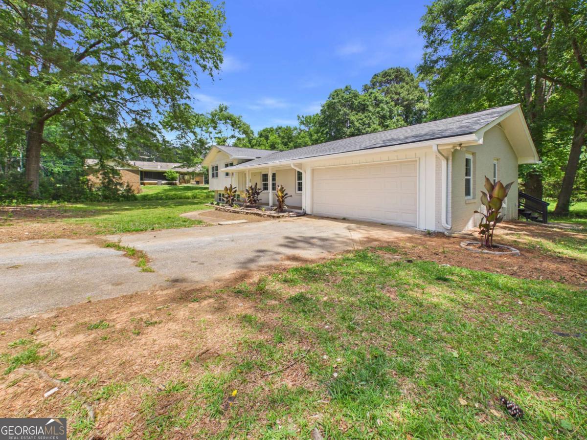6740 Tell Road Fairburn, GA 30213 - Photo 3 of 35