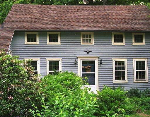 3116 High Ridge Road Stamford, CT 06903 - Photo 1 of 1 a view of a house with brick walls and a tree
