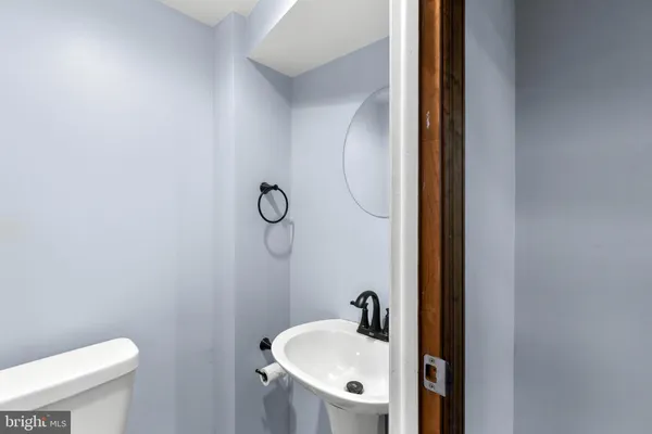 a bathroom with a sink and a toilet