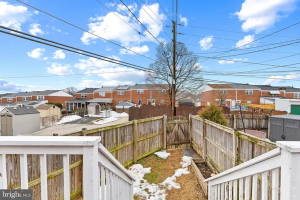 a view of a balcony with city view