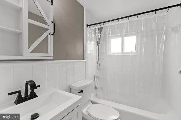 a bathroom with a sink and a toilet