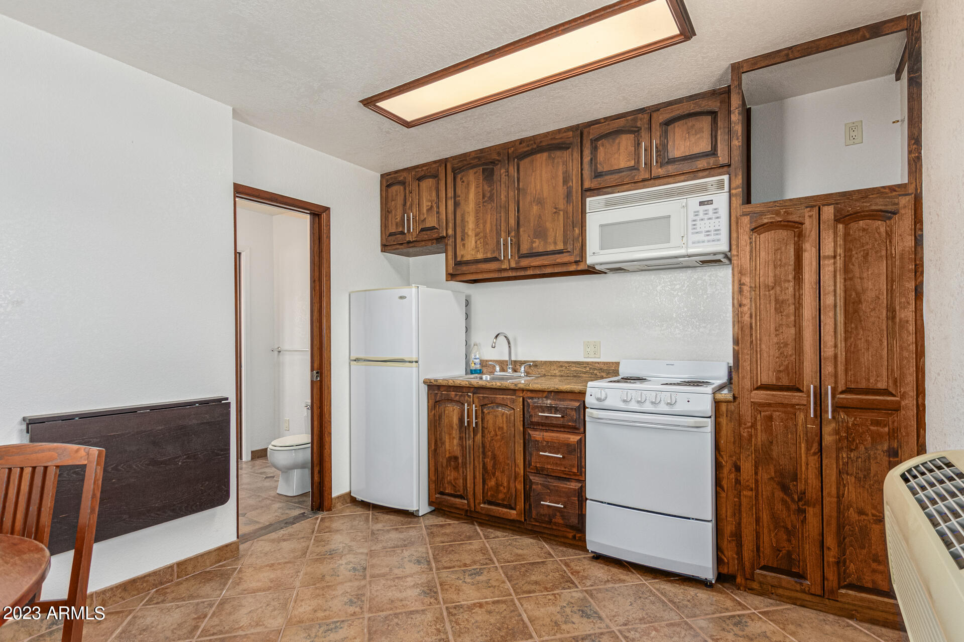 5463 North Wolverine Pass Road Apache Junction, AZ 85119 - Photo 34 of 50 Casita Kitchen/Living room