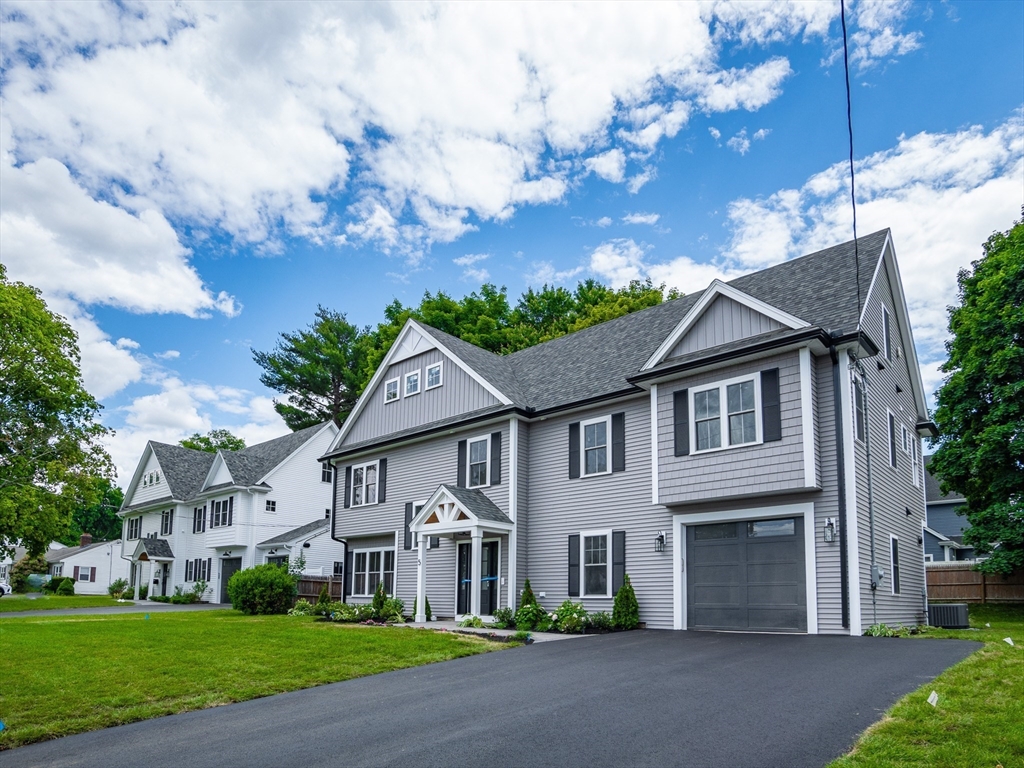 5 Stanley Street Natick, MA 01760 - Photo 20 of 21 front view of a house with a yard