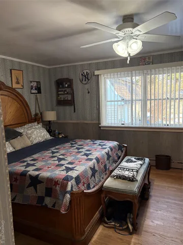 a bedroom with a bed and a table in it