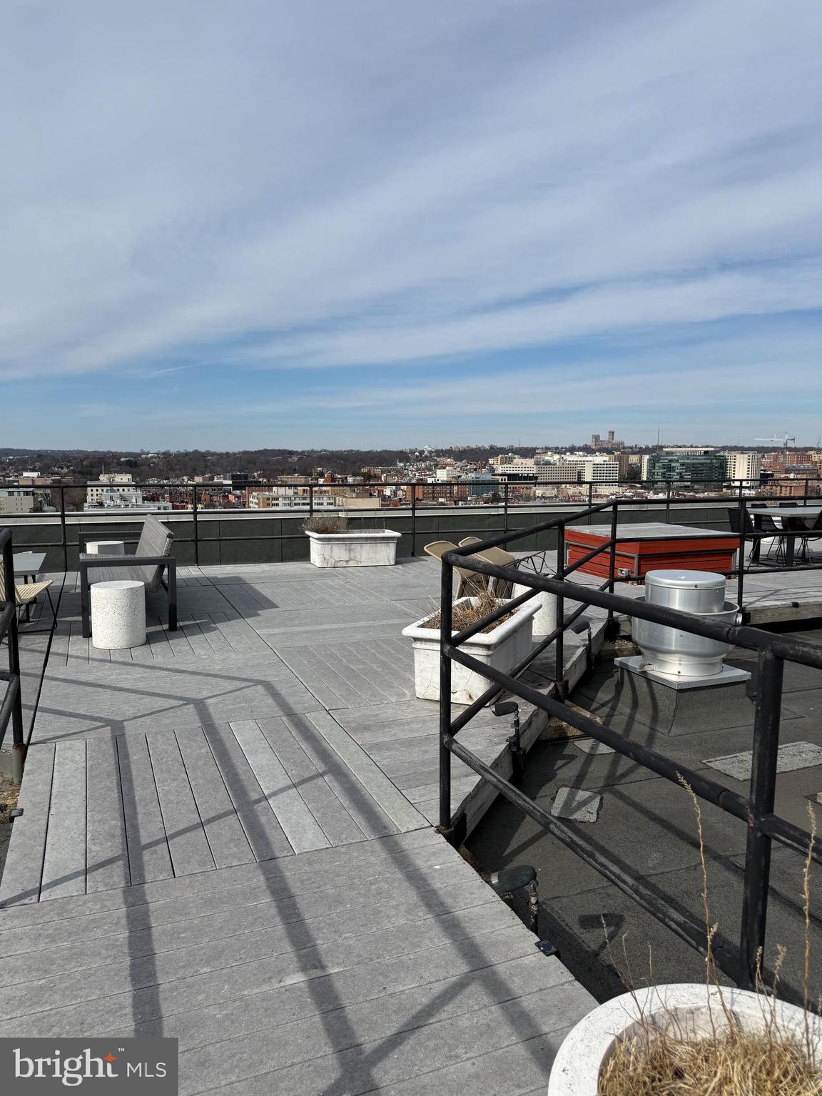 1615 Q Street Northwest, Unit 509 Washington, DC 20009 - Photo 5 of 16 a view of a terrace with seating area