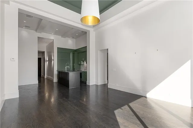 a view of a large window with wooden floor