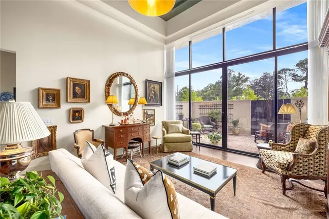 a bedroom with a bed and a chair