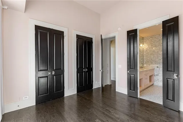 a bathroom with a sink a mirror and a shower