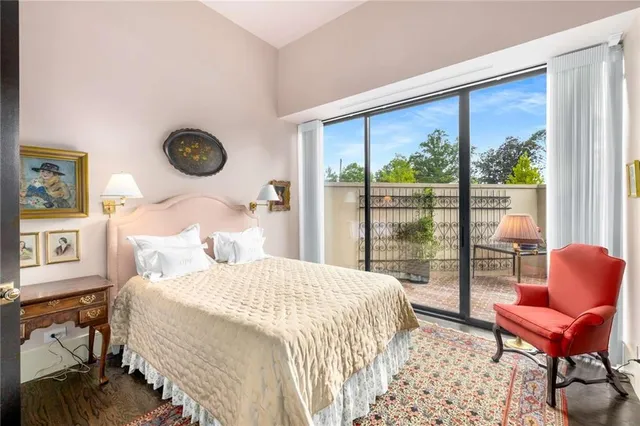 a bathroom with a toilet and a shower curtain