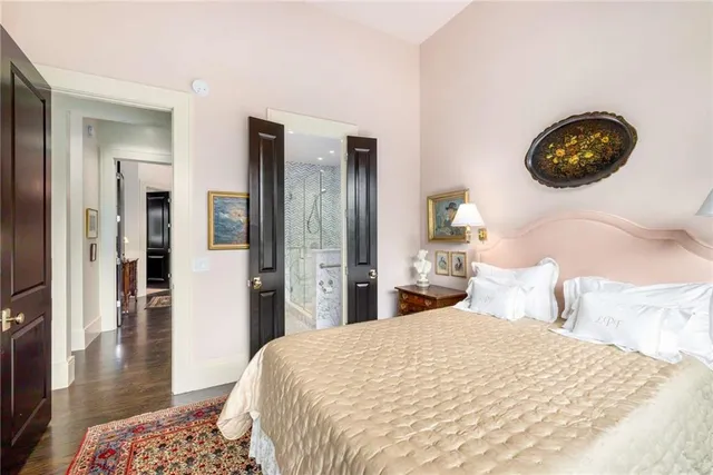 a living room with furniture and a book shelf