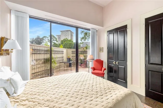 a view of a room with rack on the wall and a window