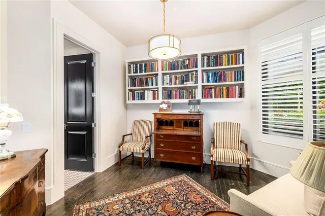 a view of a balcony with chair potted plant