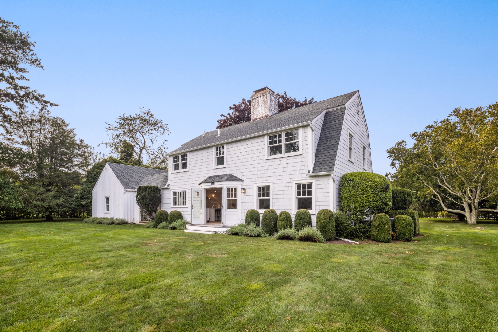 30 Cobb Isle Road Water Mill, NY 11976 - Photo 2 of 10 a view of a house with backyard