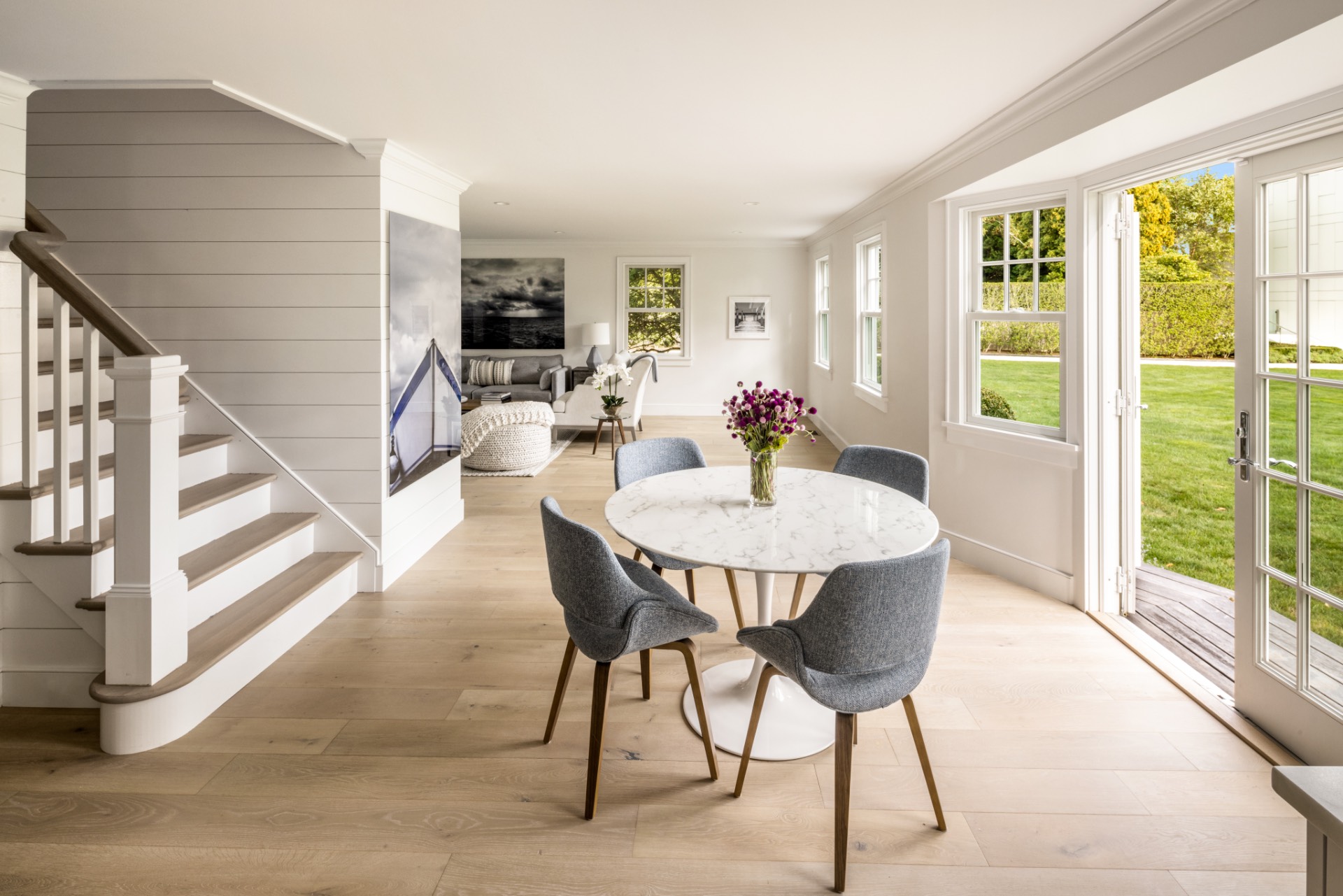 30 Cobb Isle Road Water Mill, NY 11976 - Photo 5 of 10 a view of a dining room with furniture window and wooden floor