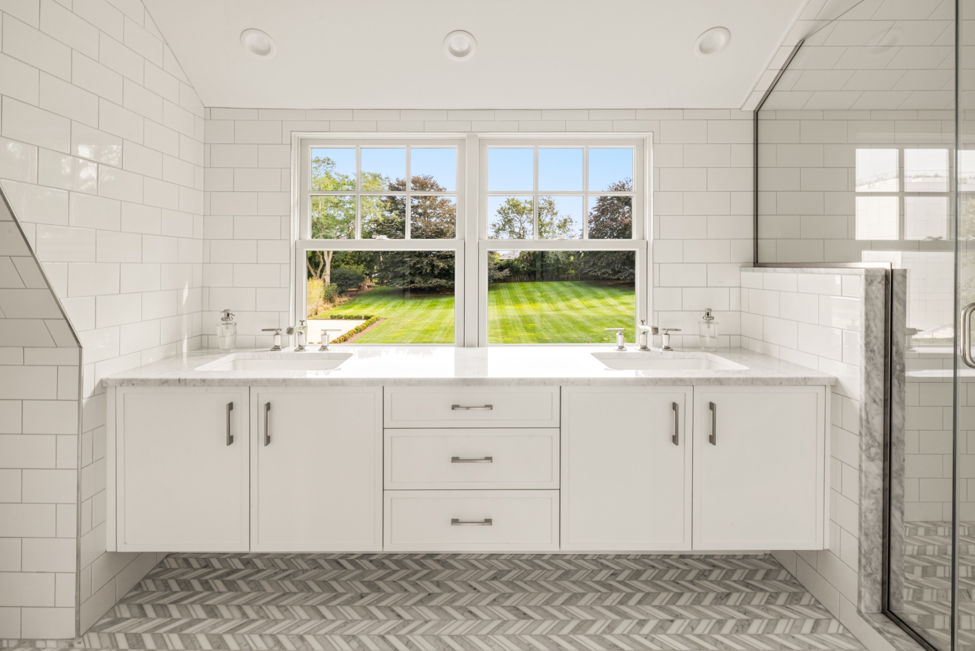 30 Cobb Isle Road Water Mill, NY 11976 - Photo 7 of 10 a bathroom with a sink and a window