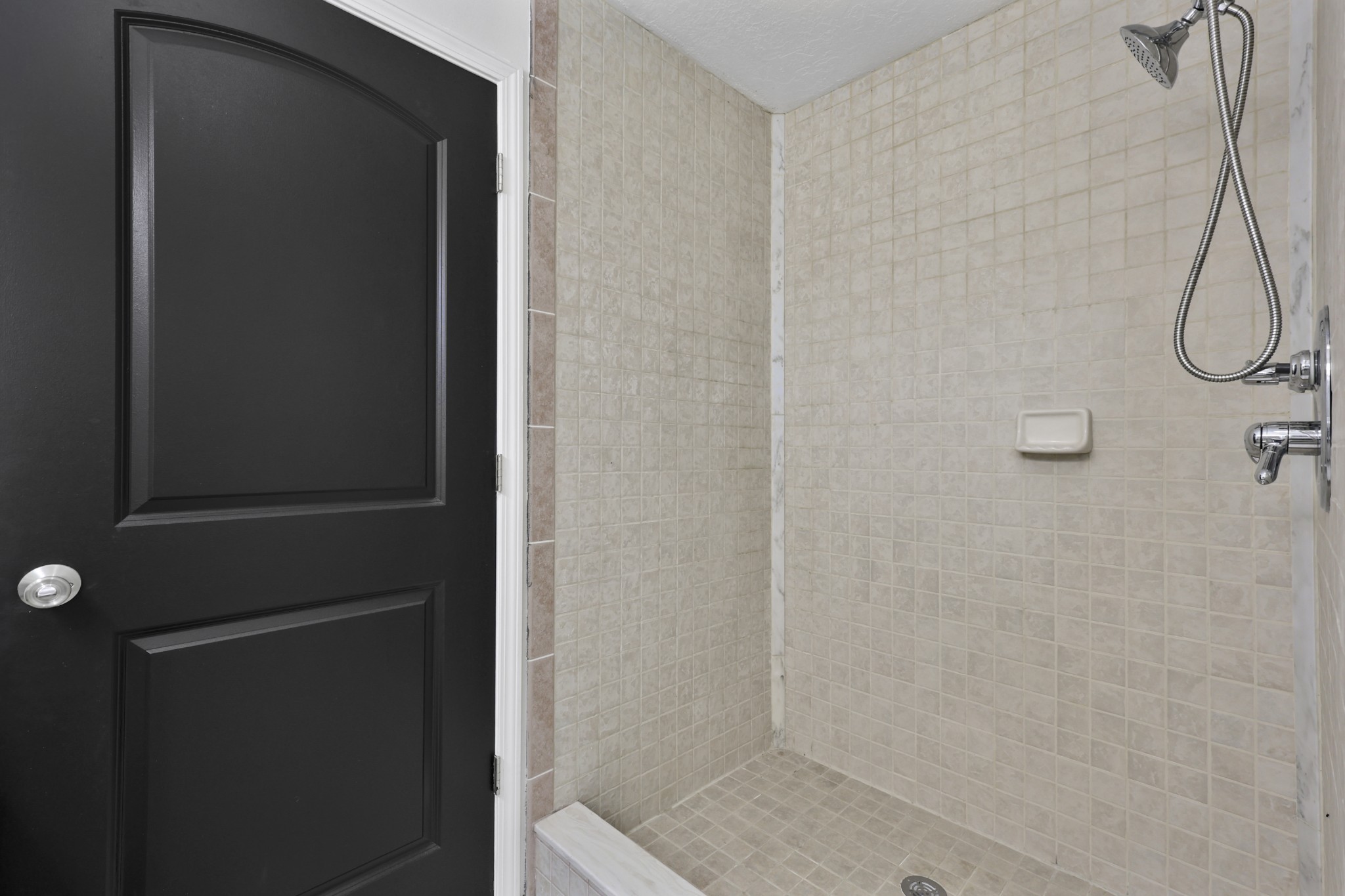 185 Sunset Pass Big Sandy, TN 38221 - Photo 22 of 52 a bathroom with a glass shower door