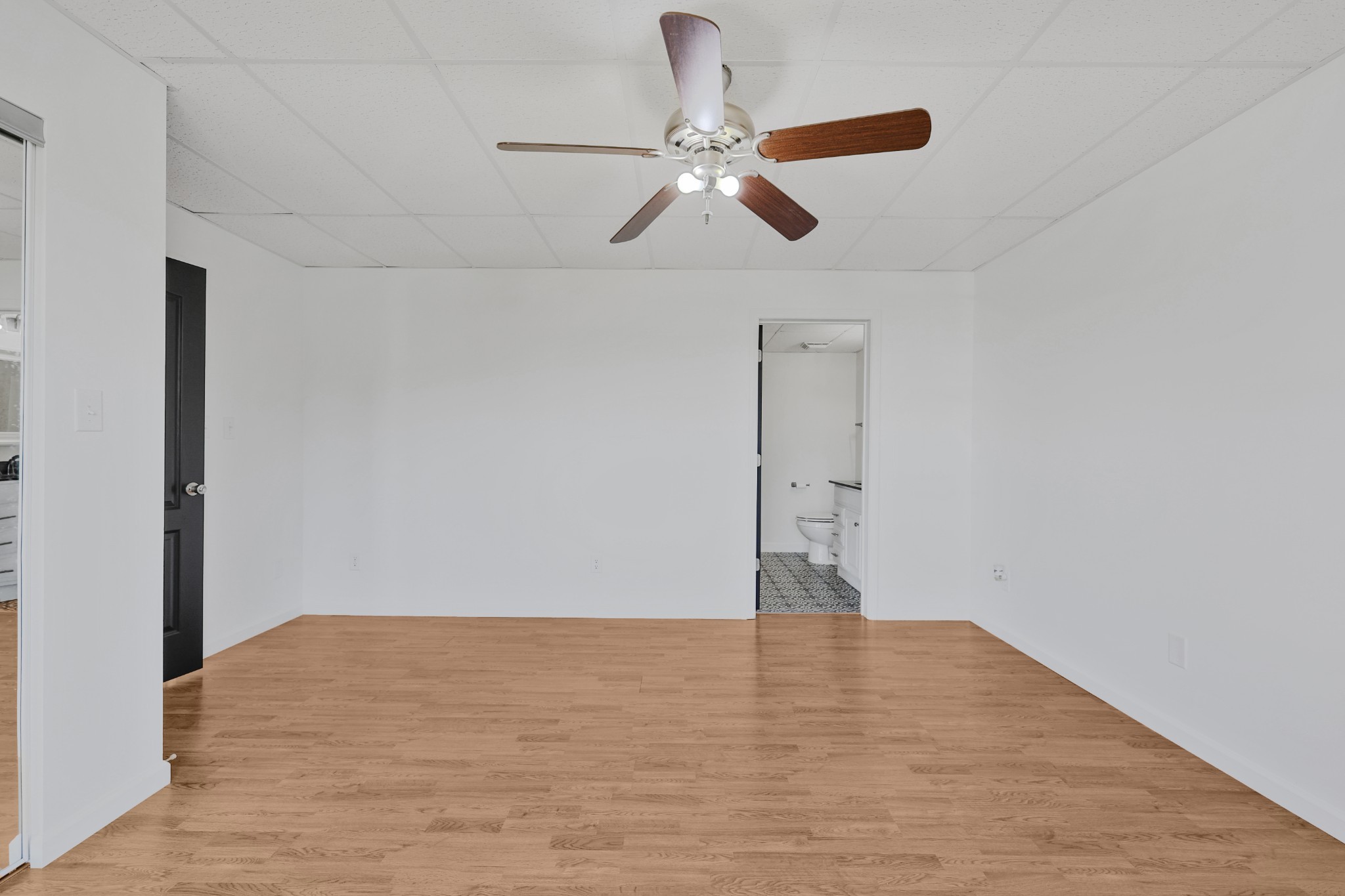 185 Sunset Pass Big Sandy, TN 38221 - Photo 25 of 52 a view of empty room with wooden floor