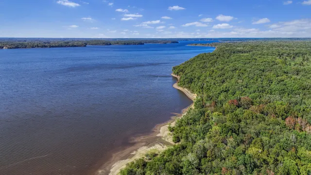 a view of a pathway of a building with a yard