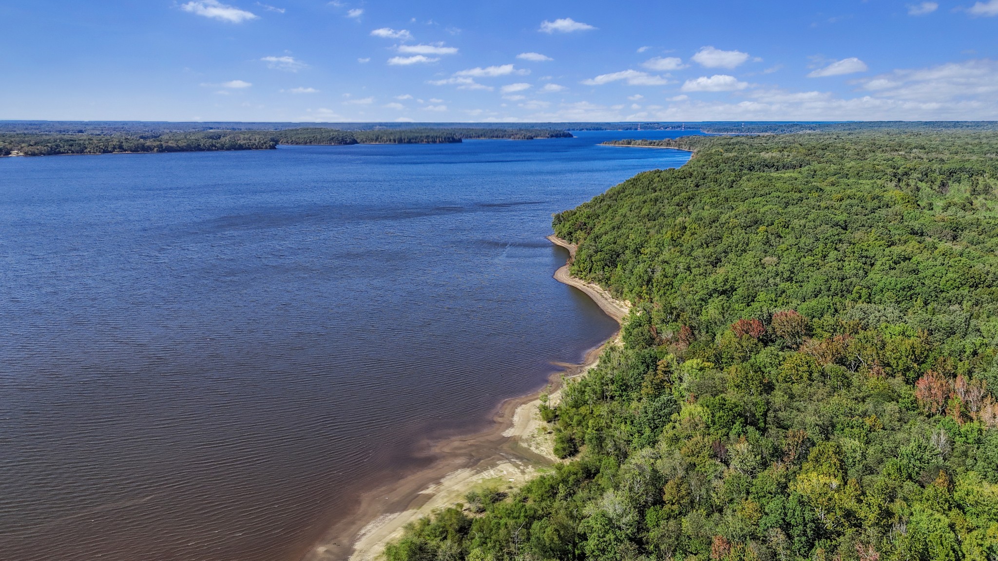 185 Sunset Pass Big Sandy, TN 38221 - Photo 3 of 52 a view of a pathway of a building with a yard