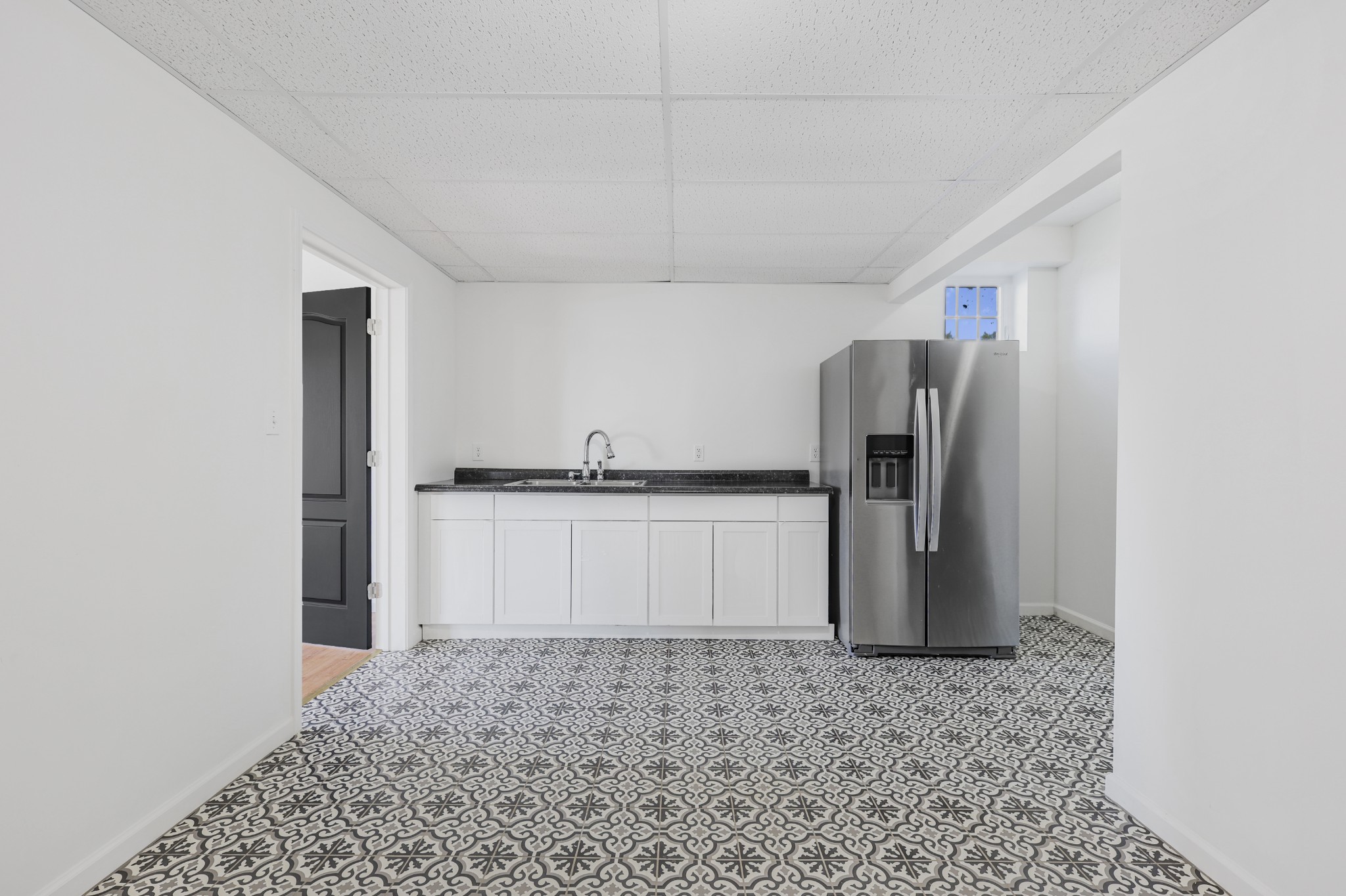 185 Sunset Pass Big Sandy, TN 38221 - Photo 32 of 52 a view of a refrigerator in kitchen and a sink