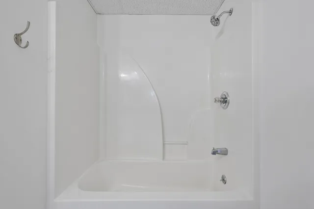 a view of a backyard of the house