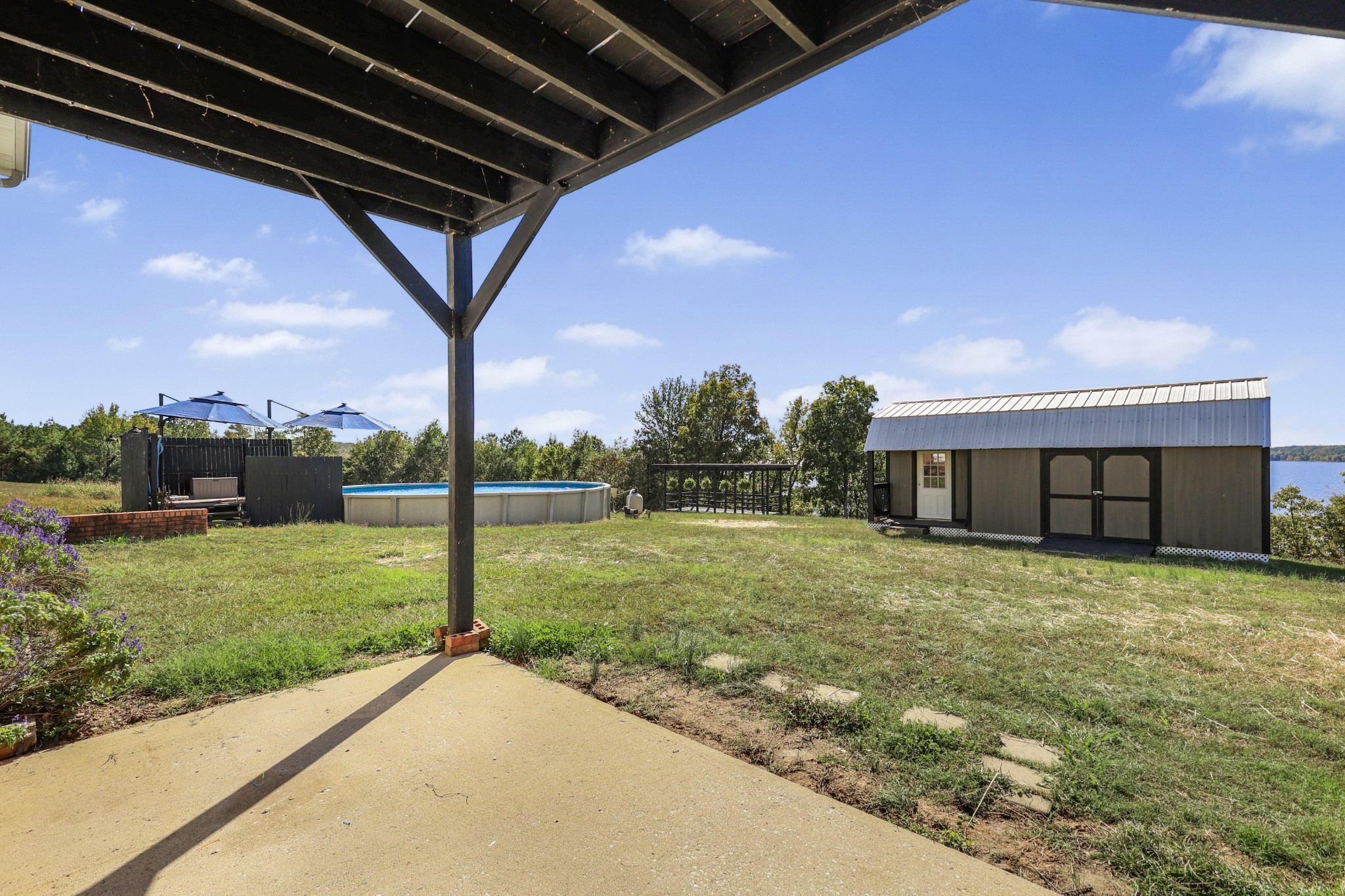 185 Sunset Pass Big Sandy, TN 38221 - Photo 38 of 52 a view of a backyard of the house