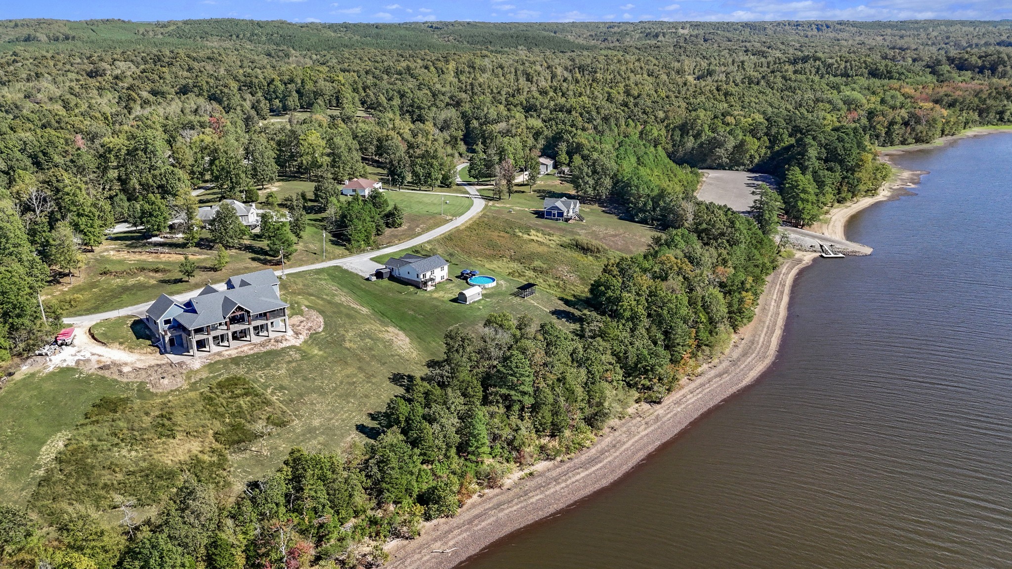 185 Sunset Pass Big Sandy, TN 38221 - Photo 48 of 52 an aerial view of a house with a yard