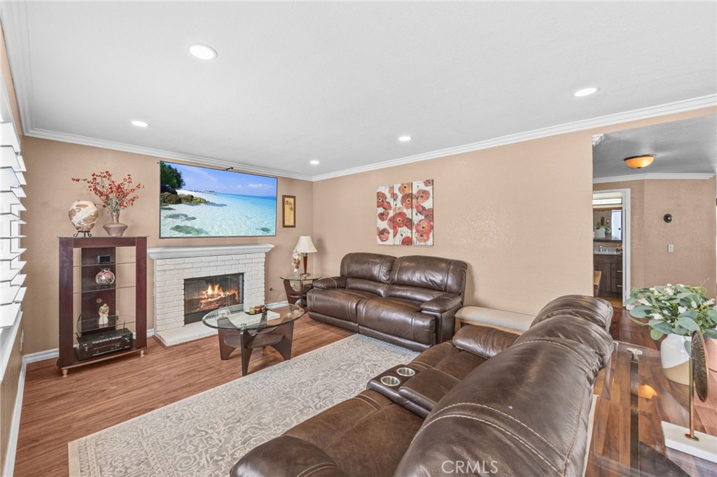 20257 Edmund Road Riverside, CA 92508 - Photo 21 of 53 a living room with furniture and a fireplace