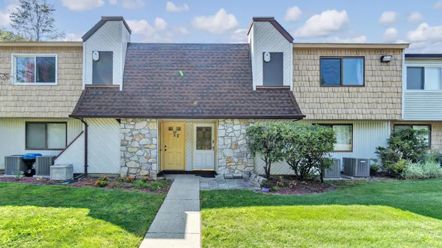 a front view of house with yard